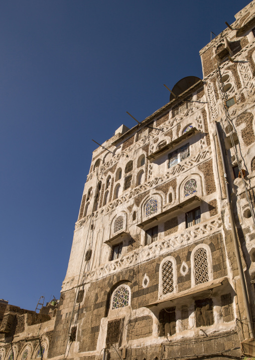 Traditional houses in the old city featuring ornamental facades, Amanat Al-Asemah, Sanaa, Yemen