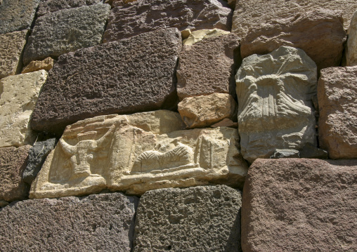 Bull head carved Iin stone on a house wall, Al Bayda Governorate, Rada, Yemen