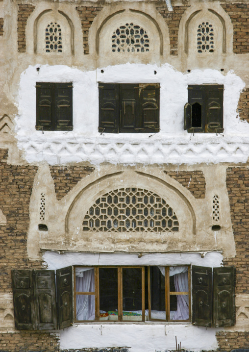 Traditional house in the old city featuring stained-glass windows, Amanat Al-Asemah, Sanaa, Yemen