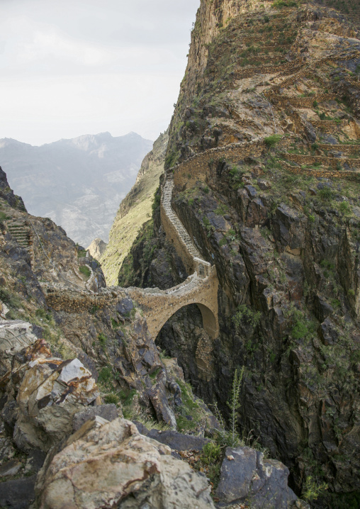 The Shahara bridge over a rocky gorge, Amran Governorate, Shaharah, Yemen