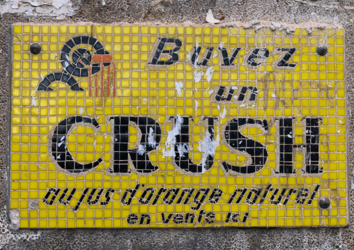 Advertisement for Crush orange juice made with mosaic, North Africa, Algiers, Algeria