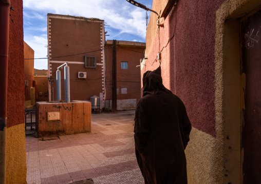 Algerian man wearing a burnous in the street, North Africa, Tamanrasset, Algeria