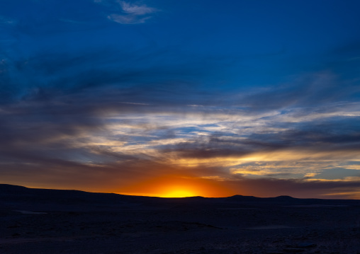 Sunset over the sand dunes in the desert, Tassili N'Ajjer National Park, Tadrart Rouge, Algeria