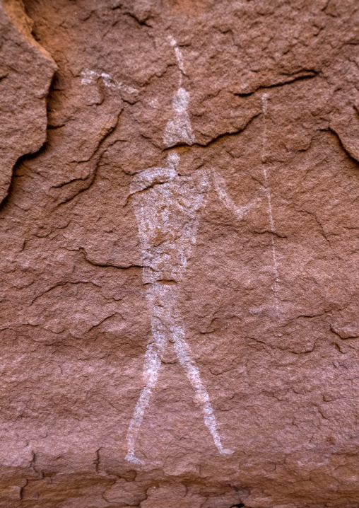 Rock painting depicting a man with a sword, Tassili N'Ajjer National Park, Tadrart Rouge, Algeria