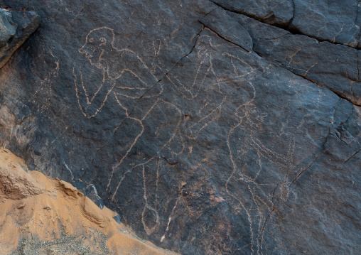 Rock carvings depicting people having sex, Tassili N'Ajjer National Park, Tadrart Rouge, Algeria