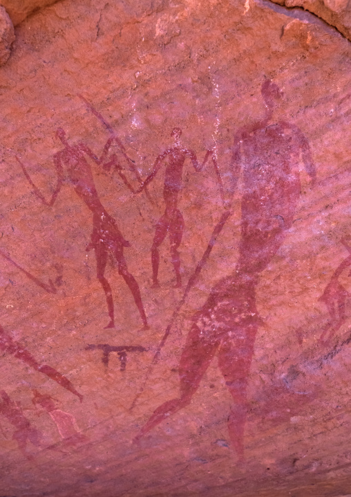 Rock painting depicting men with swords, Tassili N'Ajjer National Park, Tadrart Rouge, Algeria