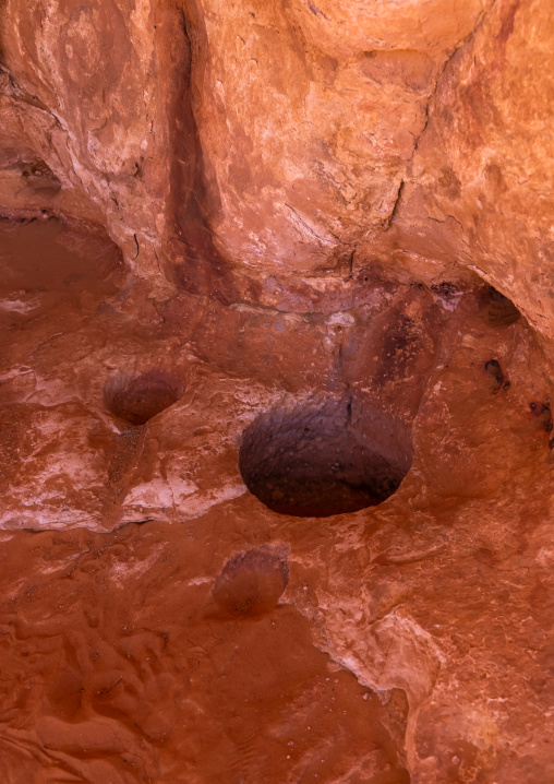 Holes in sandstone to collect water, Tassili N'Ajjer National Park, Tadrart Rouge, Algeria
