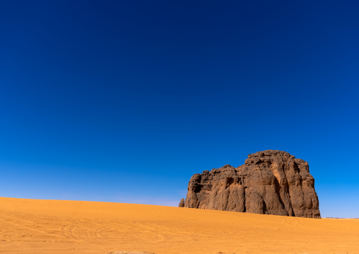 Rocks and sand dunes in Sahara desert, North Africa, Erg Admer, Algeria