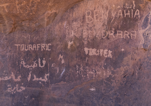 Vandalized rock in the desert, North Africa, Erg Admer, Algeria