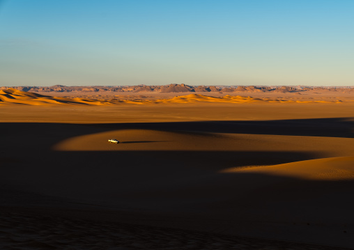 Four wheels in the sand dunes in the Sahara desert, North Africa, Erg Admer, Algeria