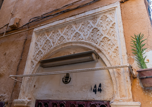 Stucco decoration above a traditional house door, North Africa, Ghardaia, Algeria