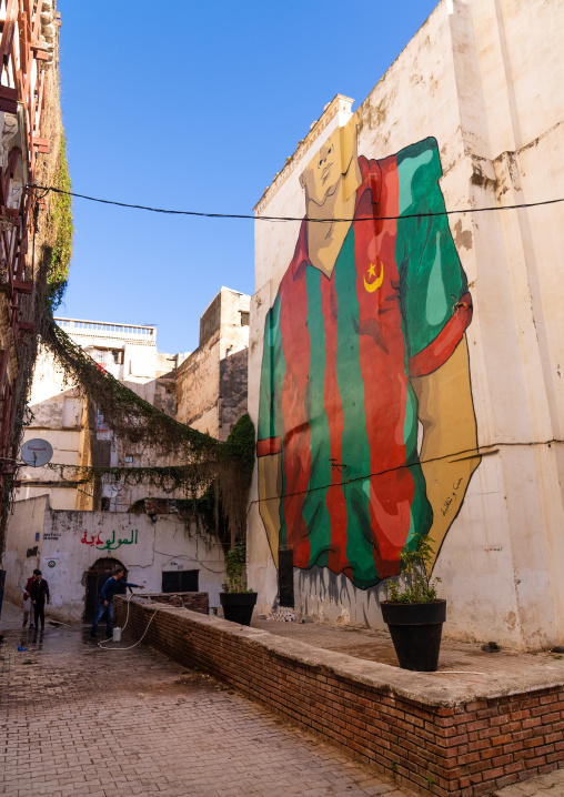 Streetscape in the Casbah with a giant football mural, North Africa, Algiers, Algeria