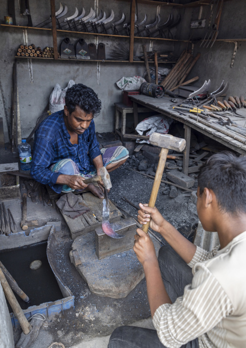 Bangladeshi blacksmith working, Dhaka Division, Dhaka, Bangladesh