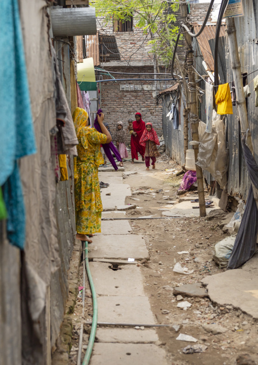 Bangladeshi girls in the backstreet of a slum, Dhaka Division, Dhaka, Bangladesh