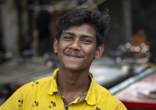 Portrait of a bangladeshi young man with yellow shirt, Dhaka Division, Dhaka, Bangladesh