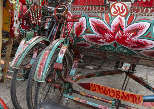 Rickshaw decorated with painted flowers, Dhaka Division, Dhaka, Bangladesh