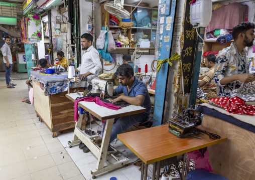 Bangladeshi men sewing inside the market, Dhaka Division, Dhaka, Bangladesh