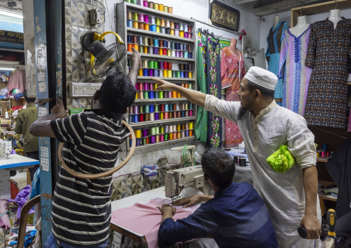 Bangladeshi men sewing inside the market, Dhaka Division, Dhaka, Bangladesh