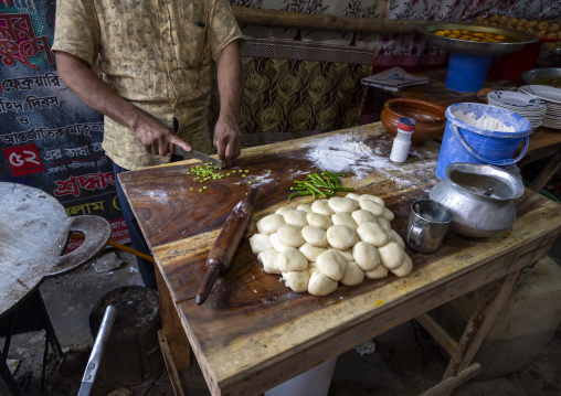 Bangladeshi man cooking inside a local restaurant, Dhaka Division, Dhaka, Bangladesh