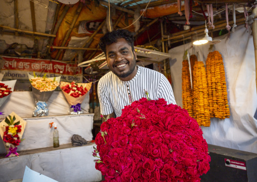 Smiling seller at fower market, Dhaka Division, Dhaka, Bangladesh