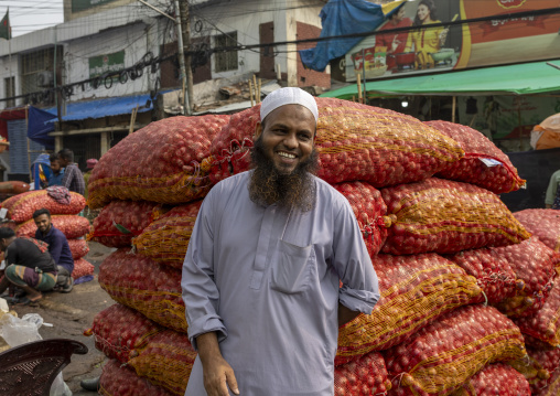 Smiling seller at vegetables and fruits morning market, Dhaka Division, Dhaka, Bangladesh