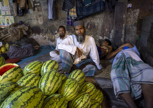 Bangladeshi man selling watermelons at Kawran Bazar market, Dhaka Division, Dhaka, Bangladesh