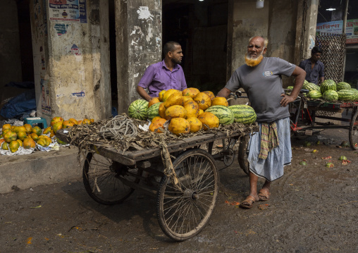 Bangladeshi men at vegetables and fruits morning market, Dhaka Division, Dhaka, Bangladesh