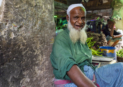 Old man with a white beard at vegetables and fruits morning market, Dhaka Division, Dhaka, Bangladesh