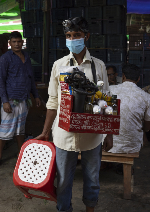 Bangladeshi man who cleans ears in the Kawran bazar, Dhaka Division, Dhaka, Bangladesh