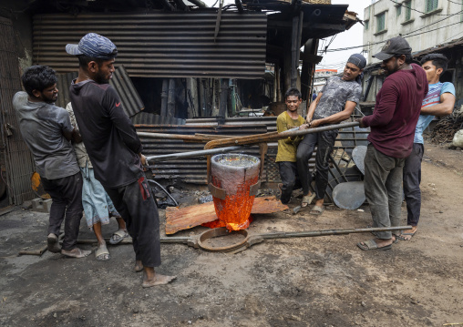 Bangladeshi workers melting steel at Dhaka Shipyard, Dhaka Division, Keraniganj, Bangladesh