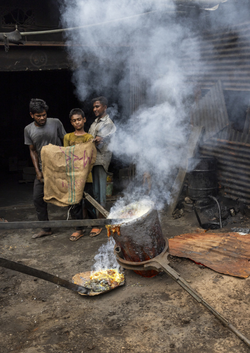 Bangladeshi workers melting steel at Dhaka Shipyard, Dhaka Division, Keraniganj, Bangladesh