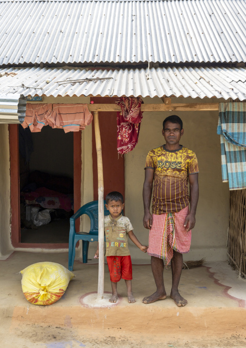 Portrait of a Santal tribe father with his son, Sylhet Division, Kamalganj, Bangladesh