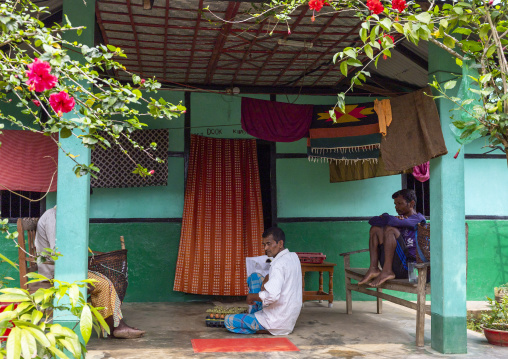 Khasi tribe men in a house courtyard, Sylhet Division, Kamalganj, Bangladesh