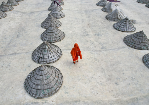 Aerial view of mounds of rice with giant hat-shaped bamboo cones, Chittagong Division, Ashuganj, Bangladesh