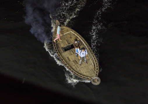 Late passengers reaching the ferry with local boat, Dhaka Division, Dhaka, Bangladesh