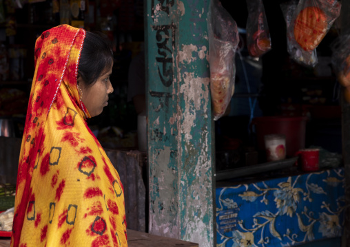 Portrait of a veiled woman in a market, Barisal Division, Harta, Bangladesh