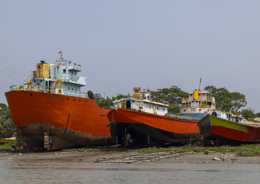 Anchored red trawlers in Sundarbans, Barisal Division, Nesarabad, Bangladesh