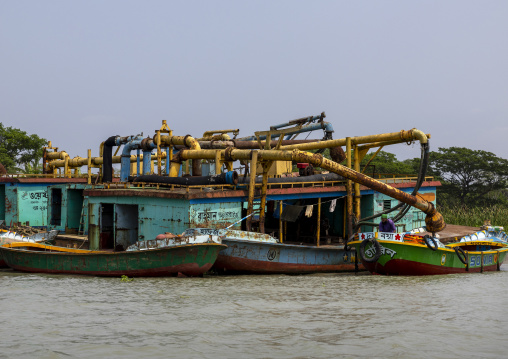 Dredger collecting sand in the river in Sundarbans, Barisal Division, Nesarabad, Bangladesh