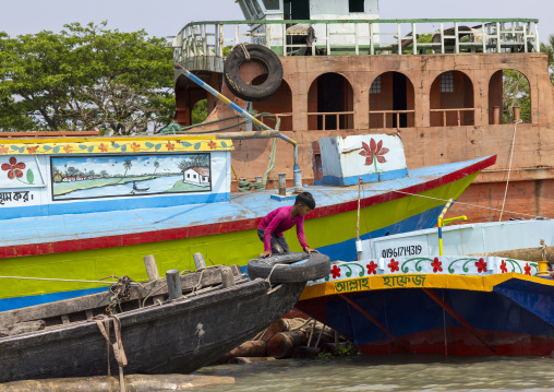 Bangladeshi boy on a boat in Sundarbans, Barisal Division, Nesarabad, Bangladesh