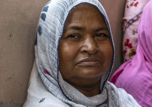 Portrait of a woman who lost her husband killed by tiger, Khulna Division, Shyamnagar, Bangladesh