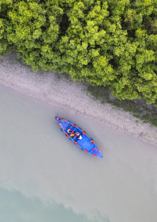 Aerial view of a boat near the mangrove in the Sundarbans, Khulna Division, Shyamnagar, Bangladesh