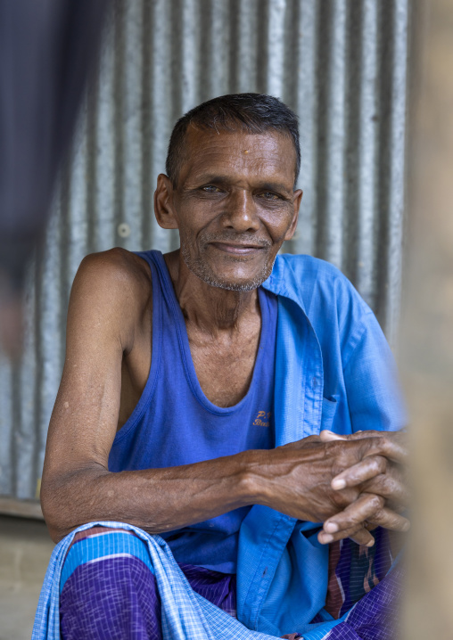 Portrait of a bangladeshi man dressed in blue, Khulna Division, Narail Sadar, Bangladesh