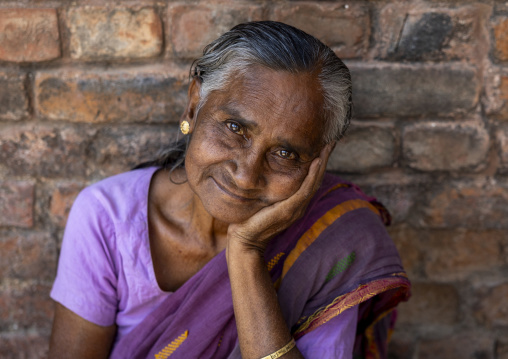 Portrait of a woman with head on her hand, Rajshahi Division, Puthia, Bangladesh