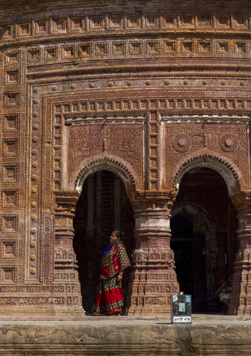 Woman standing at the entrance of Pancha Ratna Govinda temple, Rajshahi Division, Puthia, Bangladesh