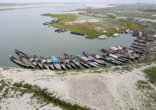 Aerial view of local boats anchored in Kalitola ghat, Rajshahi Division, Sariakandi, Bangladesh