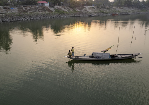 Local boat on a quiet river, Rajshahi Division, Sariakandi, Bangladesh