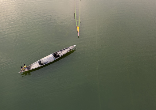 Aerial view of a local boats on a quiet river, Rajshahi Division, Sariakandi, Bangladesh