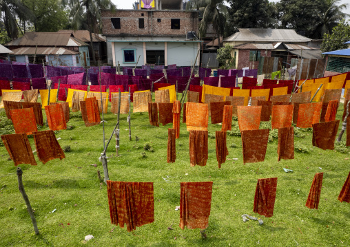 Drying fabrics under the sun, Dhaka Division, Rupganj, Bangladesh