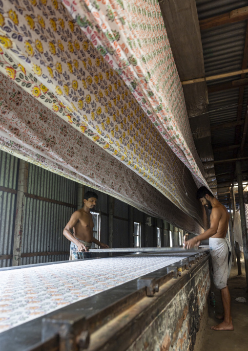 Bangladeshi workers making manual screen printing, Dhaka Division, Rupganj, Bangladesh