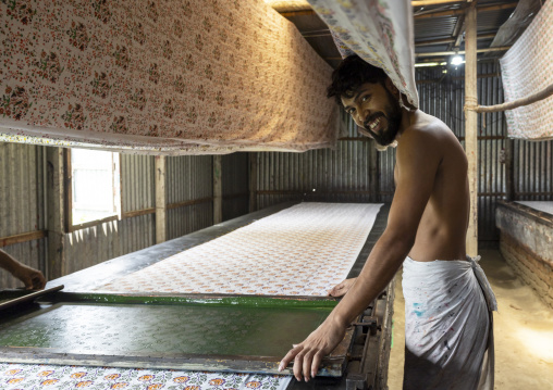 Bangladeshi workers making manual screen printing, Dhaka Division, Rupganj, Bangladesh